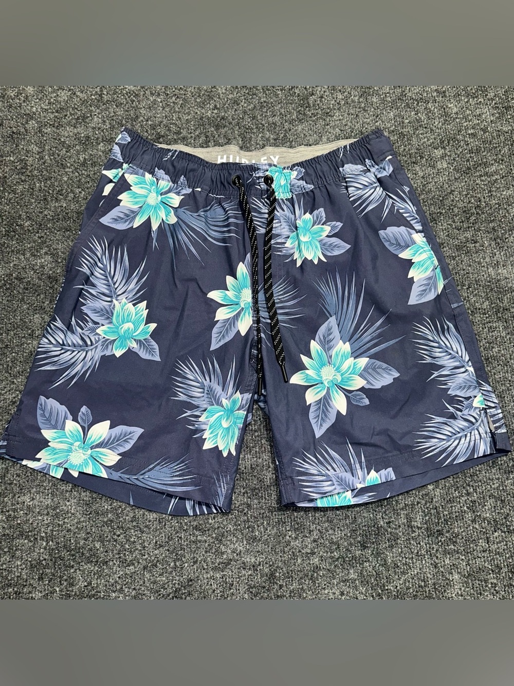 Hurley blue and white floral swim trunks with built in liner shorts